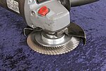 Rear view of an angle grinder with a weld root opener